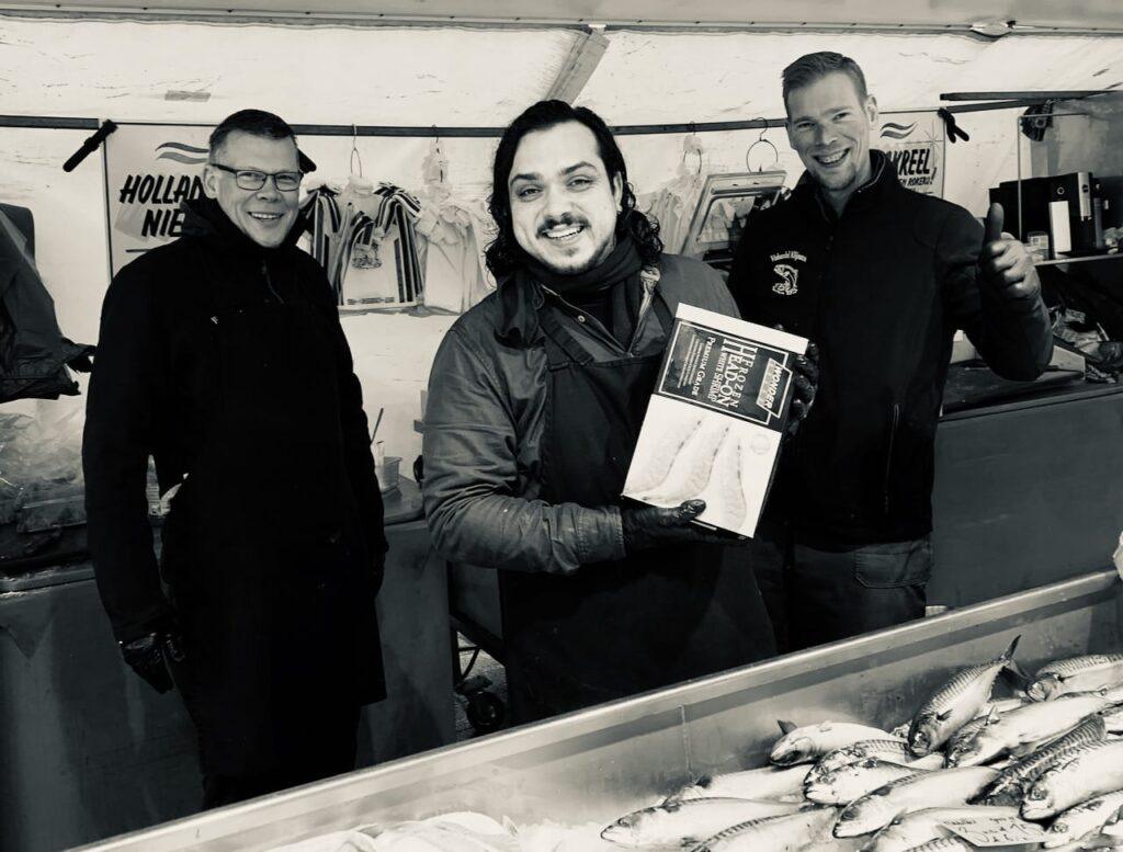 Edwin, Harun and Rudger man the stall