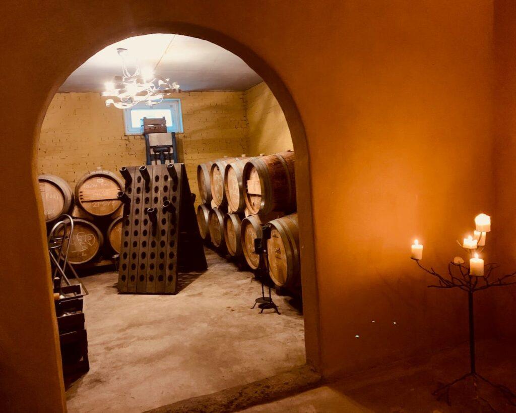The beautiful cellar which smells absolutely delicious, home to wine and port - aged in oak barrels for 7 to 10 years