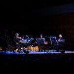 A quartet playing in the darkness