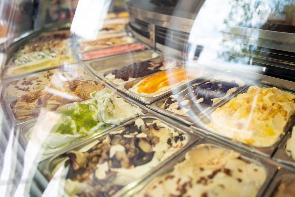 Hengolo parlour, home to the largest ice-cream display in Europe. Cabinets circulate air to maintain an even temperature. Staff are expert at scooping up just the right amount and are taught to think of the edge of the pan as their friend. Good advice for all at home too!