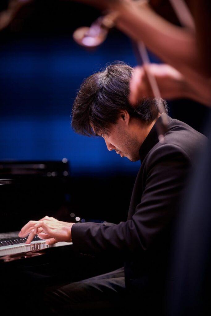 Bruce Liu plays the piano