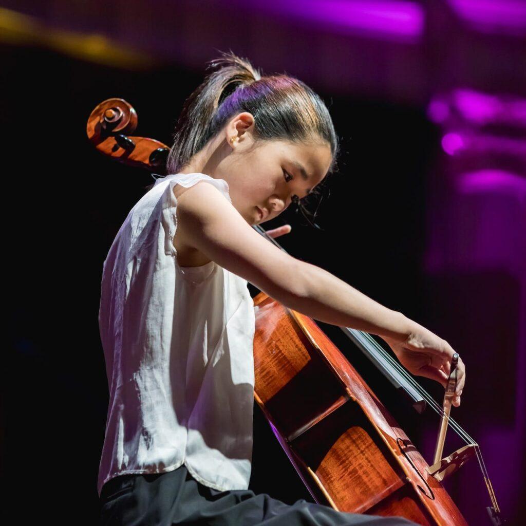 girl playing cello