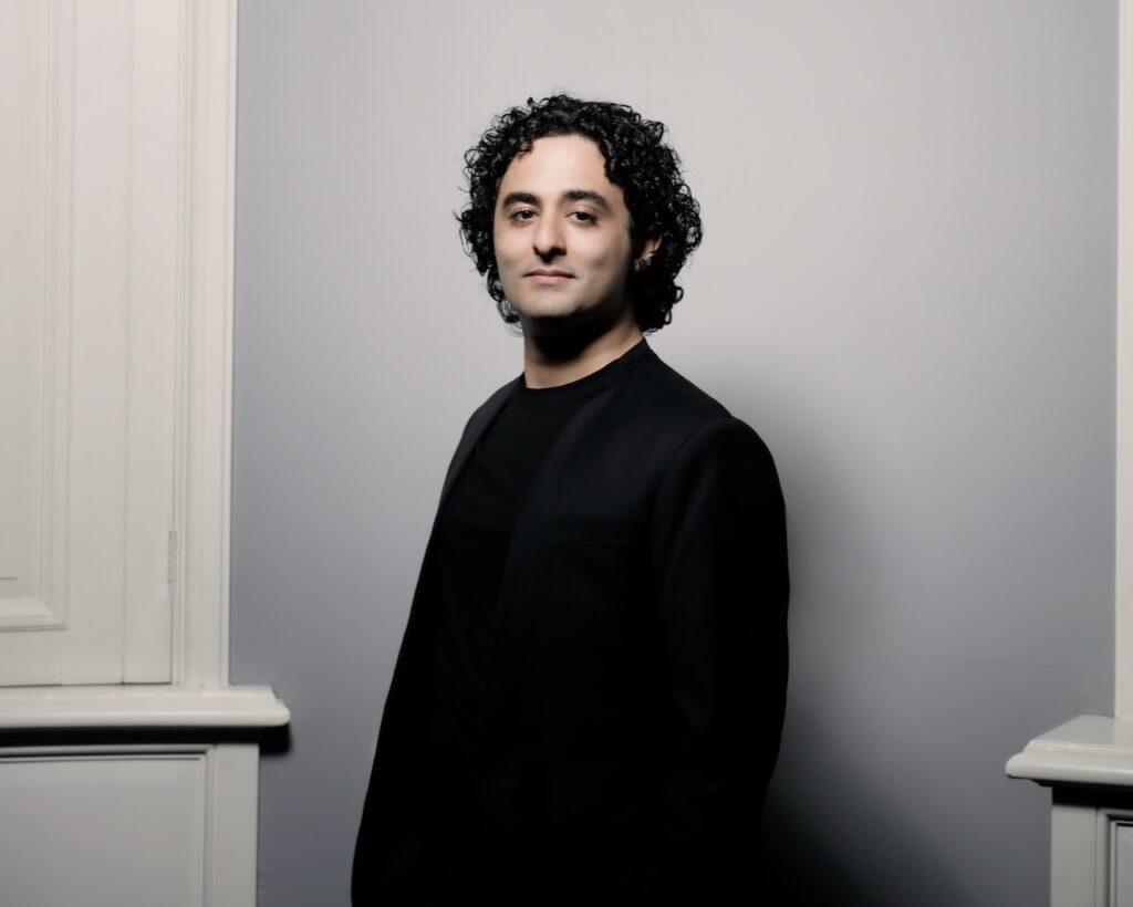 Kerem Hasan Conductor catching up with Clare Varney | Marco Borggreve