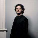 Kerem Hasan Conductor catching up with Clare Varney | Marco Borggreve