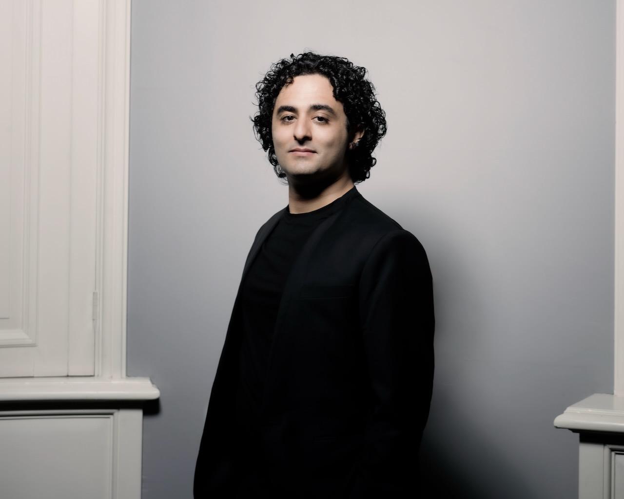 Kerem Hasan Conductor catching up with Clare Varney | Marco Borggreve